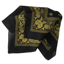 Load image into Gallery viewer, Yellow paisley bandana with floral print and black ground folded