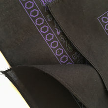 Load image into Gallery viewer, Close up of hemmed edge of black and purple bandana